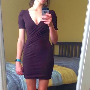 Brown skin tight low cut dress